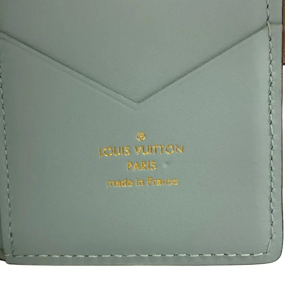 Louis Vuitton LV Vertical Wallet Compact Capucines Bifold Wallet M82198